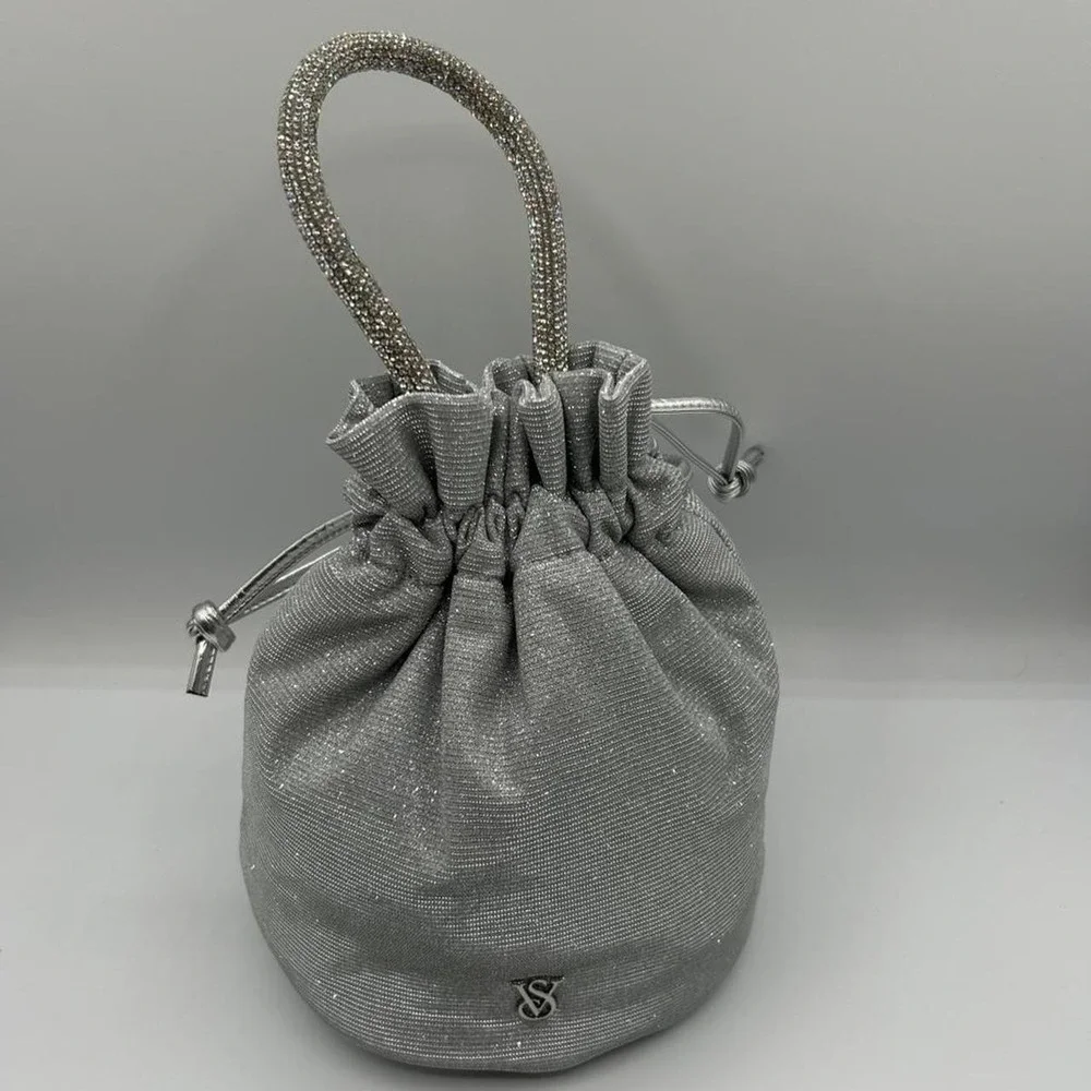 Victoria's Secret Silver glittery drawstring bag with rhinestone handle
